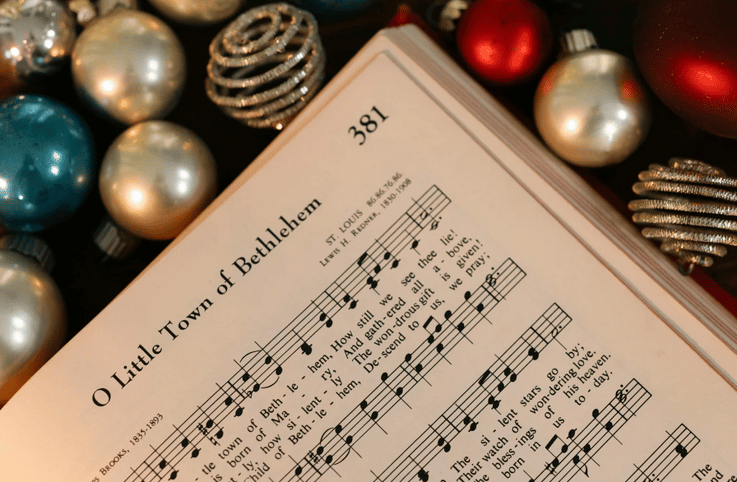 The Best Holiday Songs To Boost Morale And Keep Productivity High
